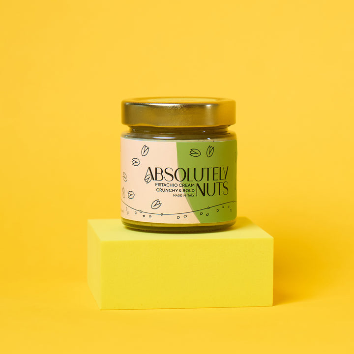 Jar of 'Absolutely Nuts' on a yellow background